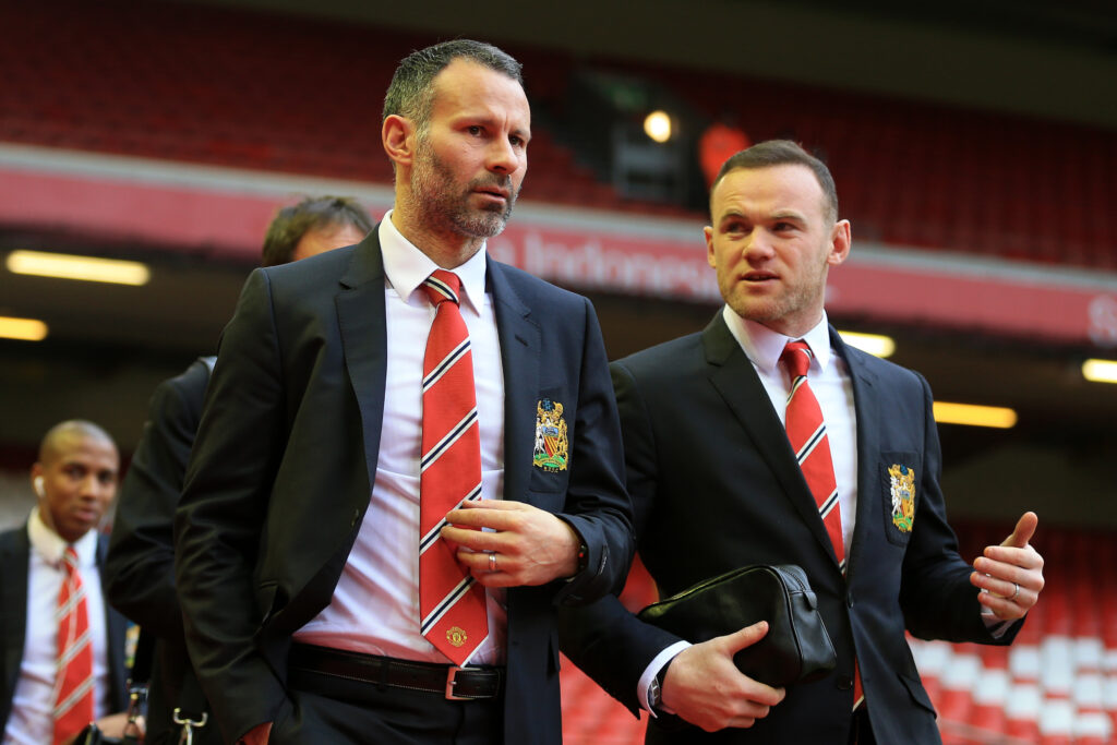 Wayne Rooney arrives with Ryan Giggs for the Barclays Premier League match between Liverpool and Manchester United at Anfield in 2016 in Liverpool, England.