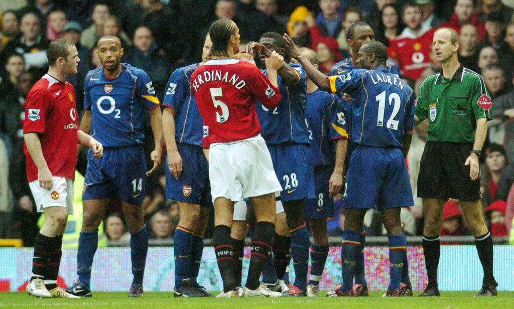 Rio Ferdinand argues with Arsenal players at Old Trafford