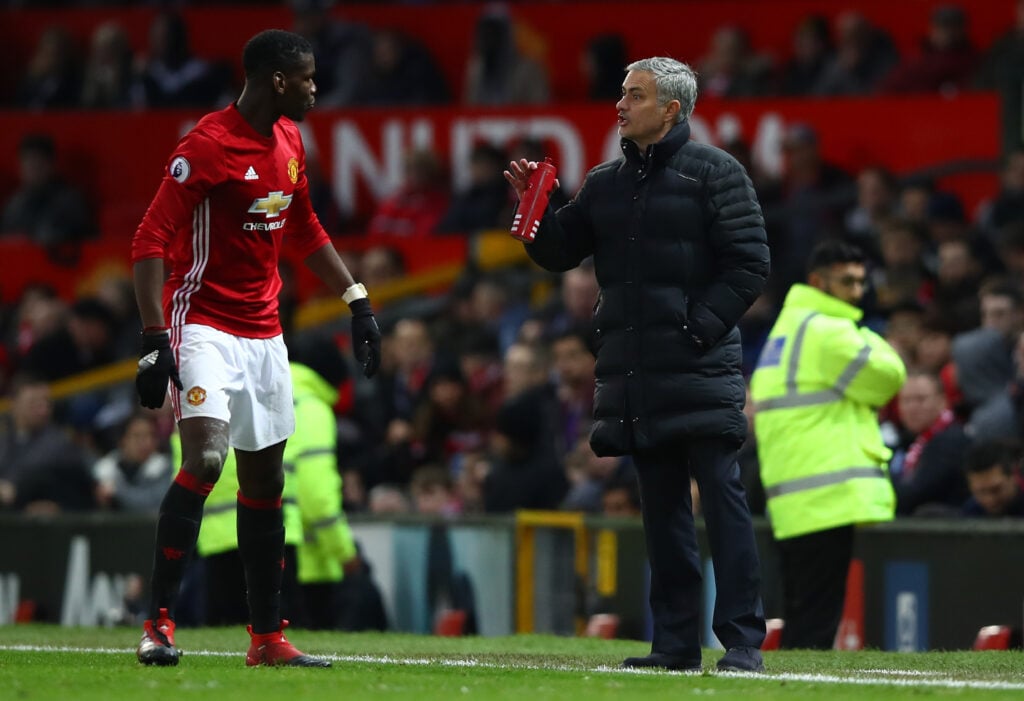 Jose Mourinho giving instructions to Paul Pogba