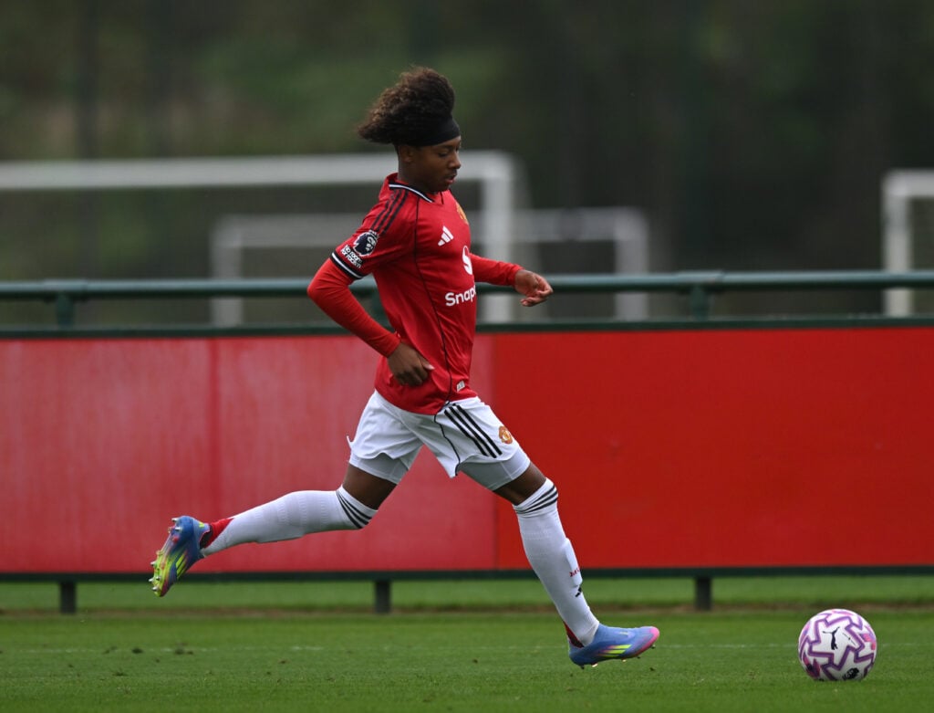 Nathaniel-Junior Brown in red kit for Man Utd u18s