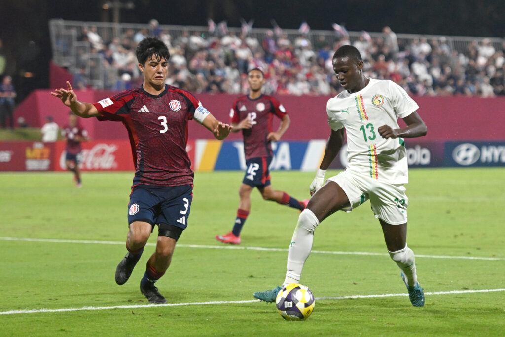 Mouhamed Dabo of Senegal is challenged by Thiago Cordero of Costa Rica during the FIFA Under-17 World Cup match between Senegal and Costa Rica at Aspire Academy on November 06, 2025