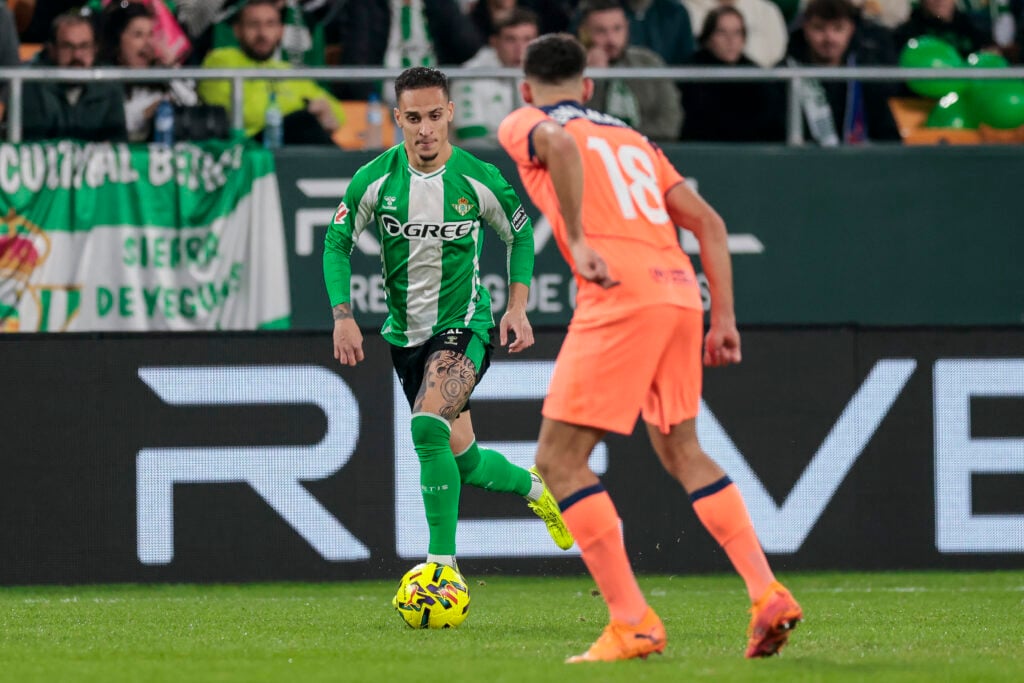 Antony Matheus dos Santos of Real Betis hits the ball during the La Liga EA Sports match between Real Betis and FC Barcelona at La Cartuja Stadium in Seville, Spain, on December 6, 2025