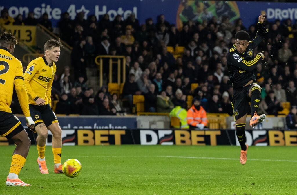 Manchester United's Amad Diallo shoots at goal during the Premier League match between Wolverhampton Wanderers and Manchester United at Molineux on December 8, 2025
