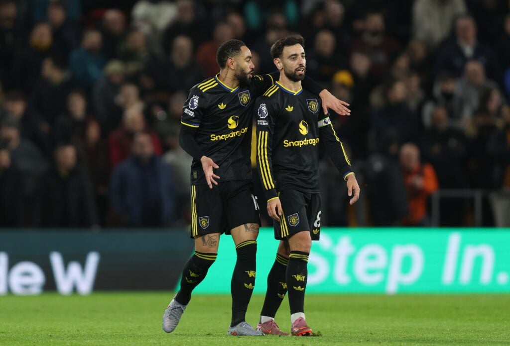 Bruno Fernandes of Manchester United goal celebration with Matheus Cunha, black kit