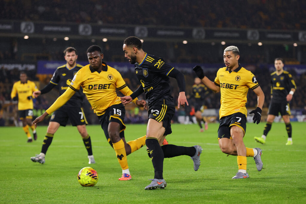 Manchester United forward Matheus Cunha facing Wolves.
