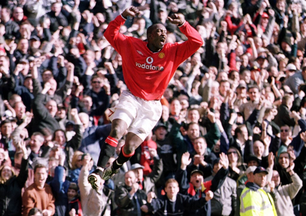 Dwight Yorke celebrates against Arsenal