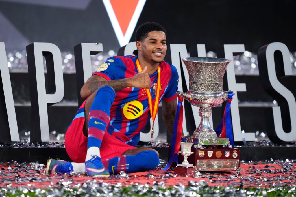 Marcus Rashford left winger of Barcelona and England celebrates with the trophy after winning the Spanish Super Cup final match between FC Barcelona and Real Madrid at King Abdullah Sports City Hall Stadium on January 11, 2026