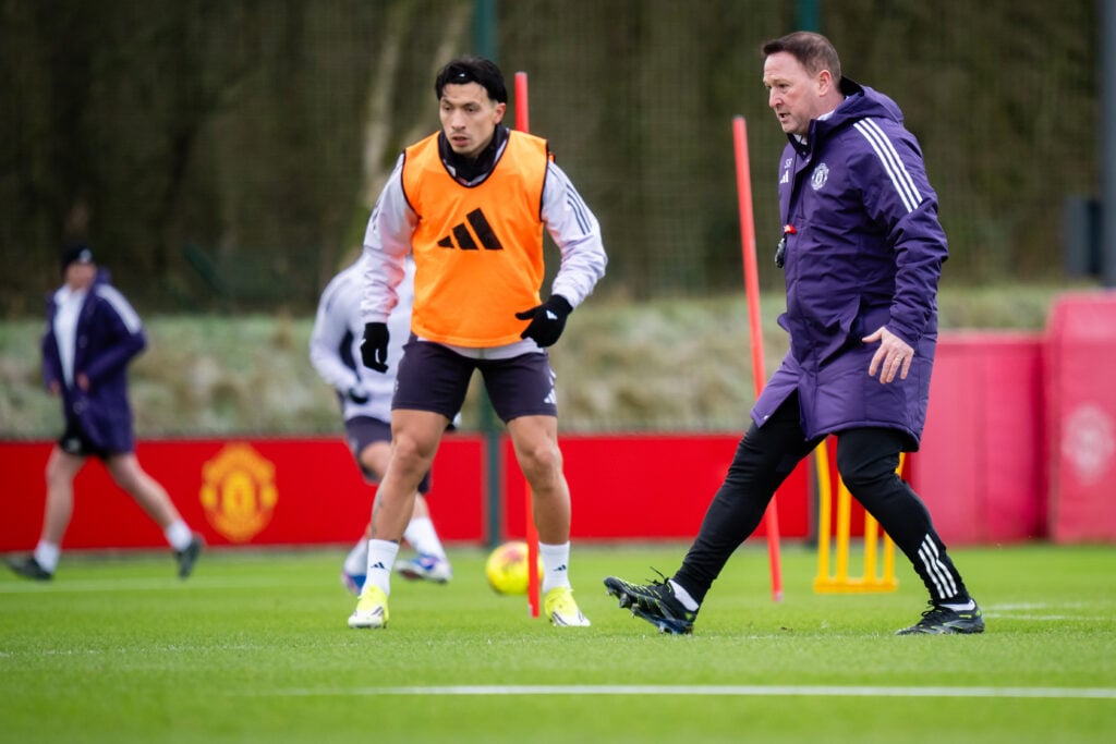 Lisandro Martinez and Steve Holland