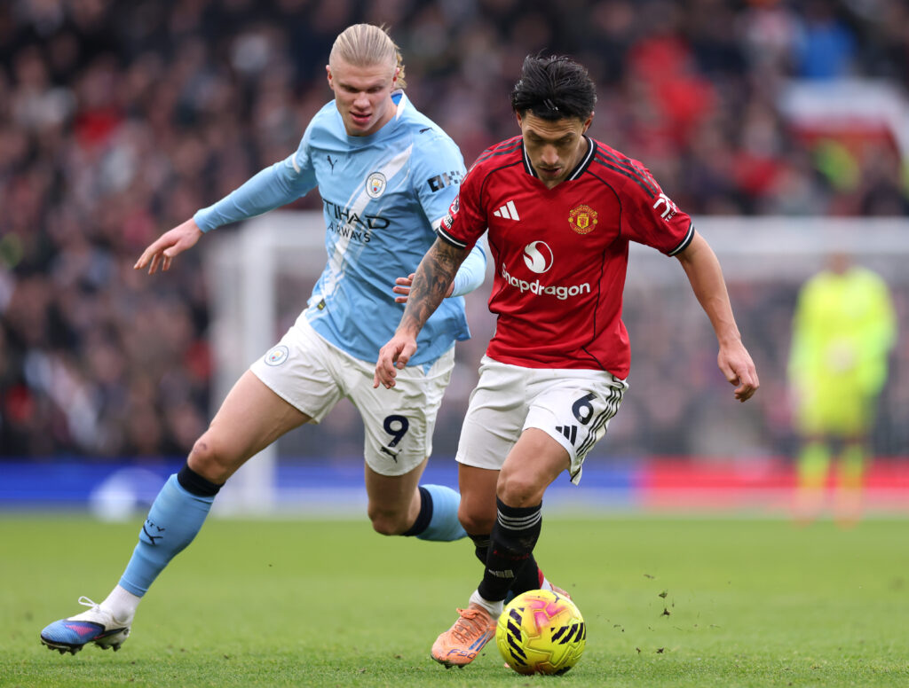 Lisandro Martinez of Manchester United is challenged by Erling Haaland of Manchester City during the Premier League match between Manchester United and Manchester City at Old Trafford on January 17, 2026