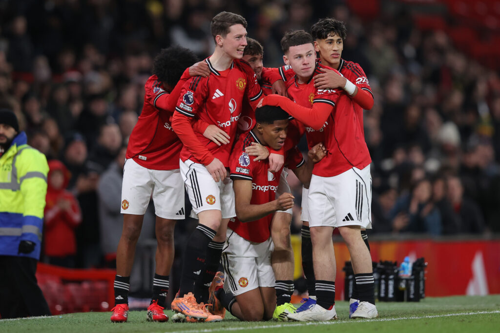 Chido Obi celebrates with teammates during Manchester United v Derby County