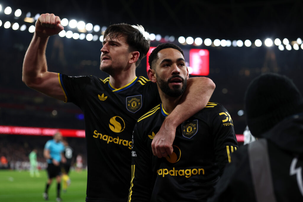 Harry Maguire and Matheus Cunha celebrate winner against Arsenal