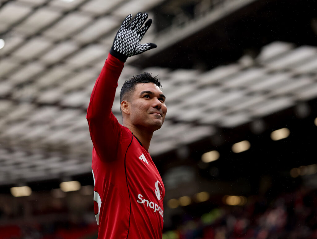 Casemiro waves at the Stretford End