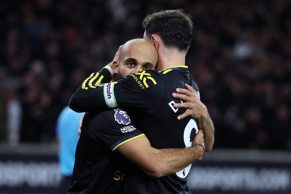 Bryan Mbeumo celebrates with Bruno Fernandes during the Premier League match between Wolverhampton Wanderers and Manchester United at the Molineux stadium in Wolverhampton, England, in 2025.