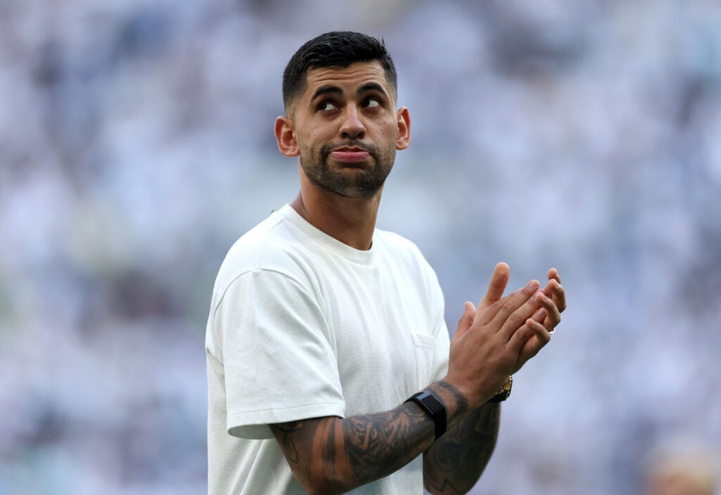 Cristian Romero applauding Tottenham fans at the end of the season