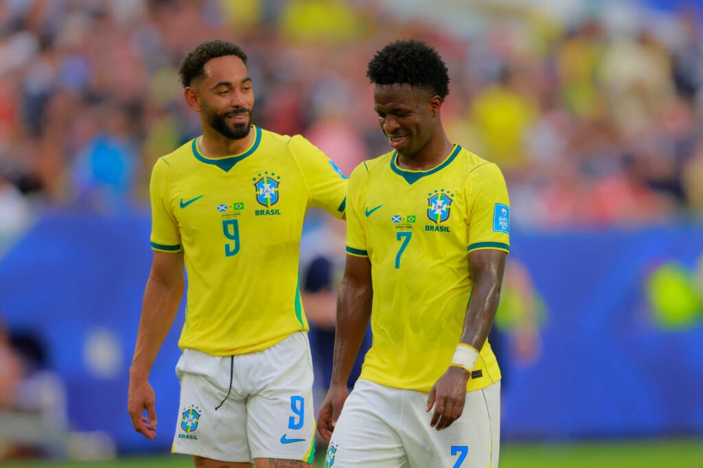 Matheus Cunha (L) and Vinicius Junior (R) of Brazil reacts during the FIFA World Cup 2026 Group C match between Scotland and Brazil at Miami Stadium on June 24, 2026 in Miami, Florida.