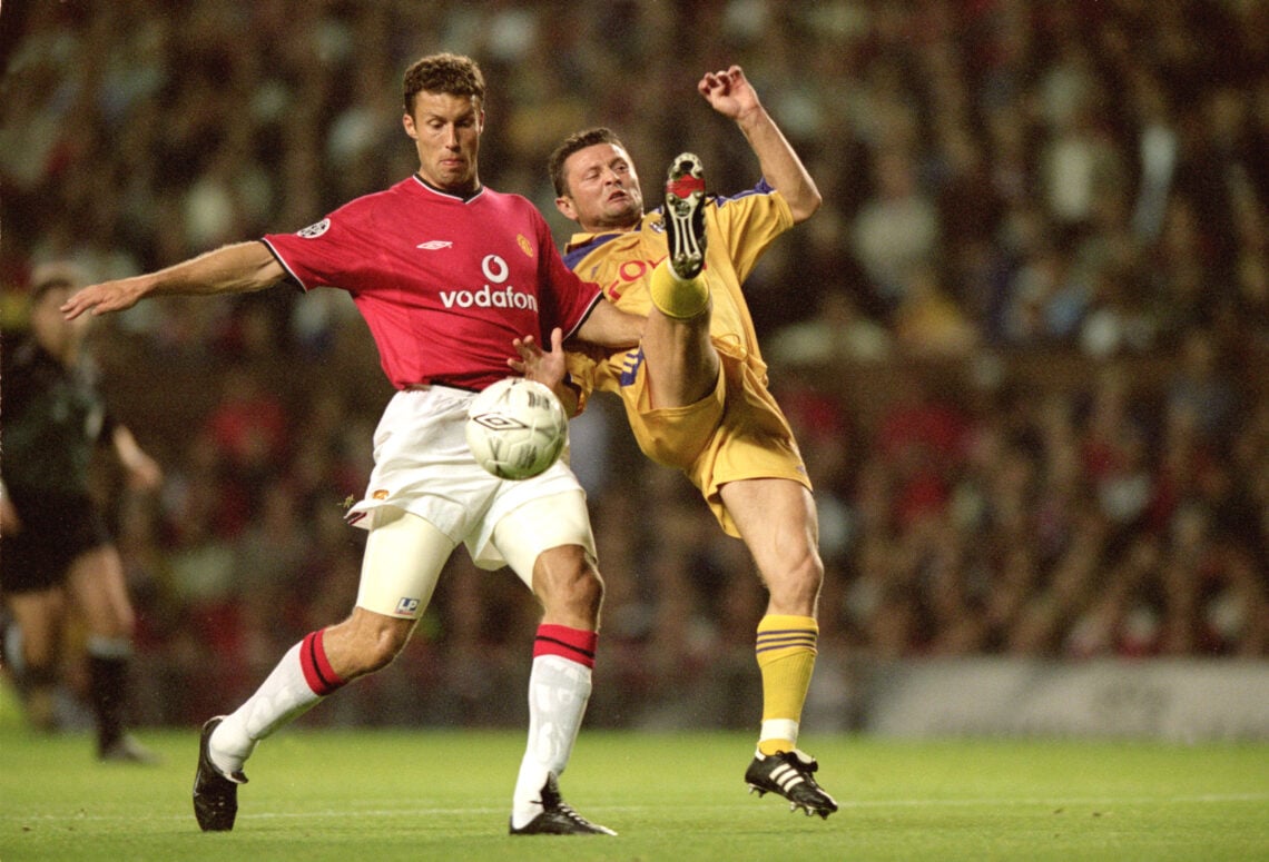 13 Sep 2000: Ronny Johnsen of Manchester United blocks Tomas Radzinski of Anderlecht during the UEFA Champions League match at Old Trafford, in Ma...