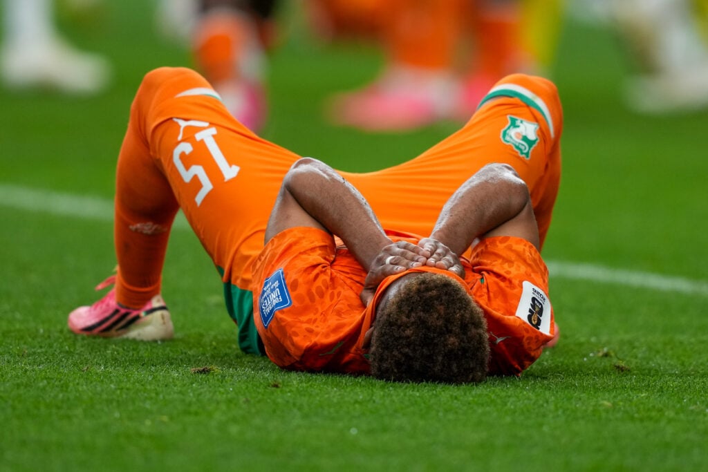Amad Diallo down on the turf after World Cup elimination