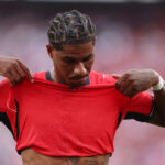 Marcus Rashford lifts his shirt against Panama