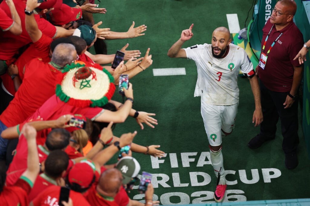 Noussair Mazraoui celebrates with Morocco fans