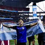 Lisandro Martinez with Argentina flag after beating England